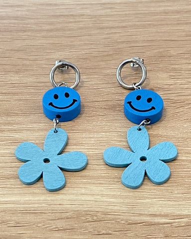 Blue daisy and smiley face earrings